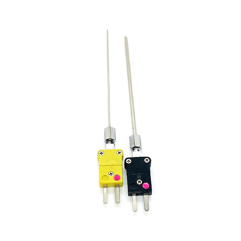 Miniature plug-type thermocouple secured by a compression fitting or clamp